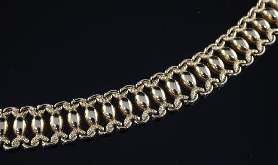 A stylish mid 20th century Italian 18ct gold ovoid link bracelet, 7.25in.